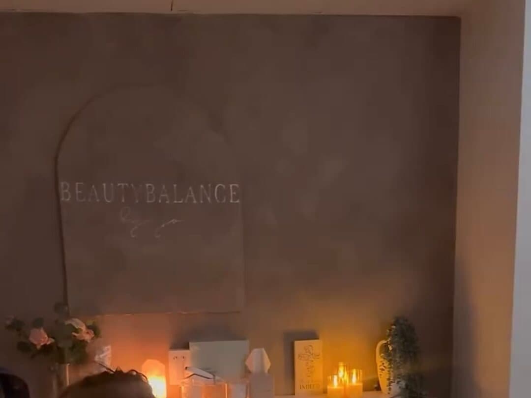 The treatment room at Beauty Balance by Jo, lit by candles